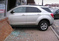 Teenager crashes into driving school while taking driving test.jpg