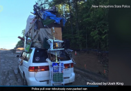 Police pull over ridiculously over-packed van.jpg
