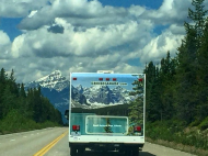 The advertisement on the back of this truck lines up almost perfectly with its real-life surroundings.jpg