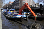 In Amsterdam, there are people paid full-time, with benefits, to fish for bikes.jpg