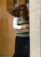The moment dodgy gas engineer tried to sneak out of court disguised as a WOMAN.jpg