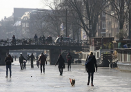 Families Take To Amsterdam's Frozen Canals For Ice Skating.jpg