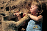 20 Mind-Blowing Images of the Little Girl Raised by Animals.jpg